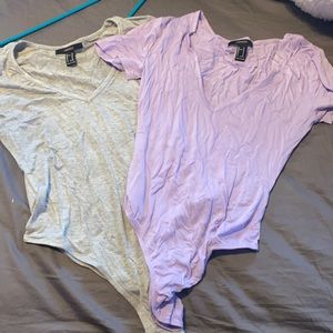 Purple and gray body suits